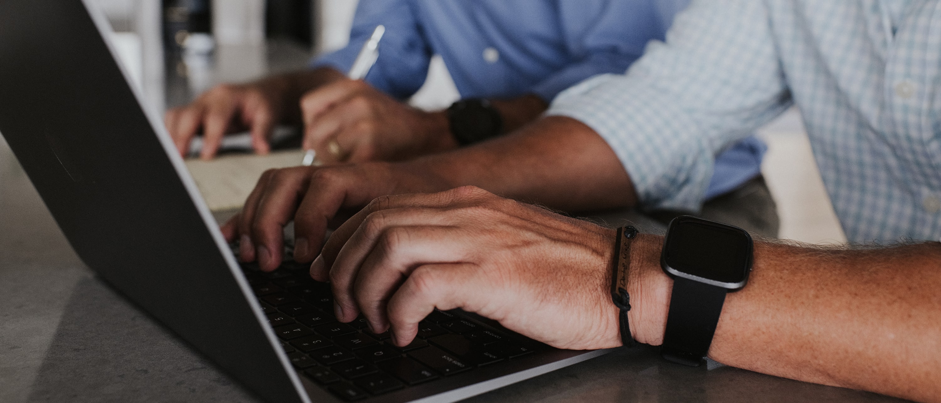 grace lane privacy policy featured image of hands typing on laptop